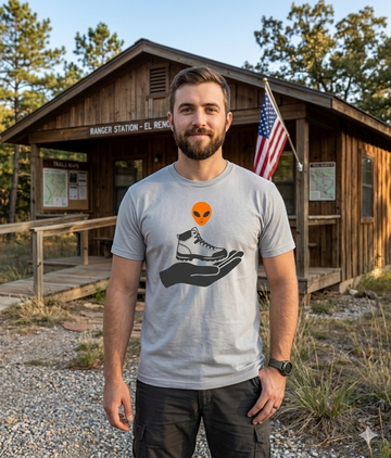 Funny Alien Hiking Gift Shirt | Strange Trails Wilderness — Alien Offers a Boot Tee
